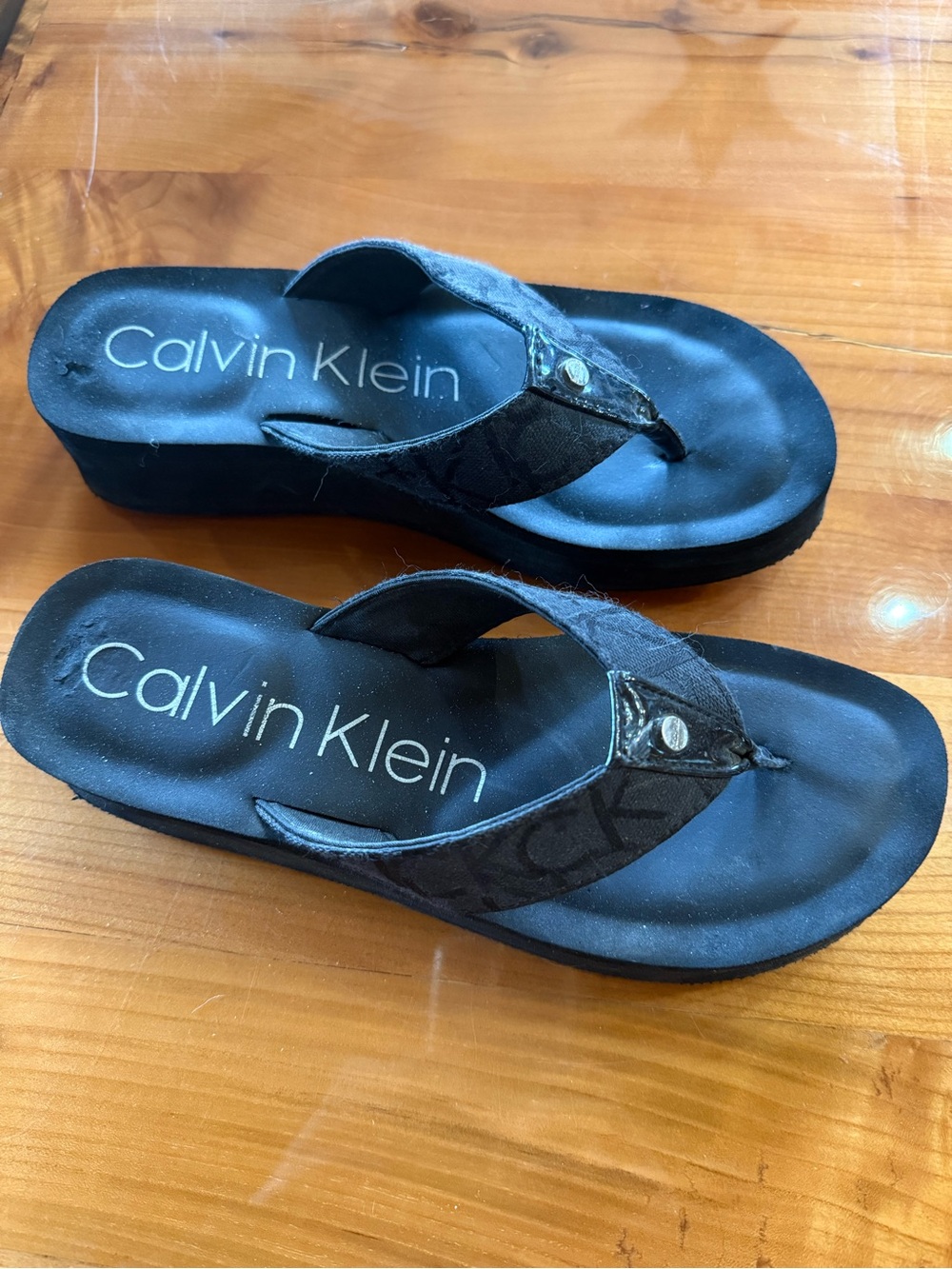 Calvin Klein women’s  Black Logo Platform Flip Flops